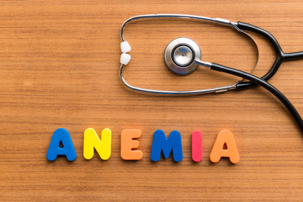anemia colorful word on the wooden background